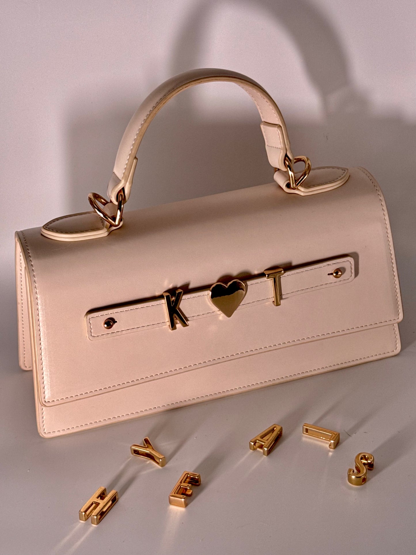 Cremefarbene Bridera Handtasche